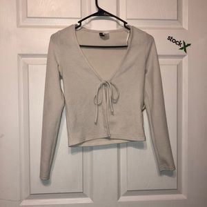 White open tie shirt with split in the very middle